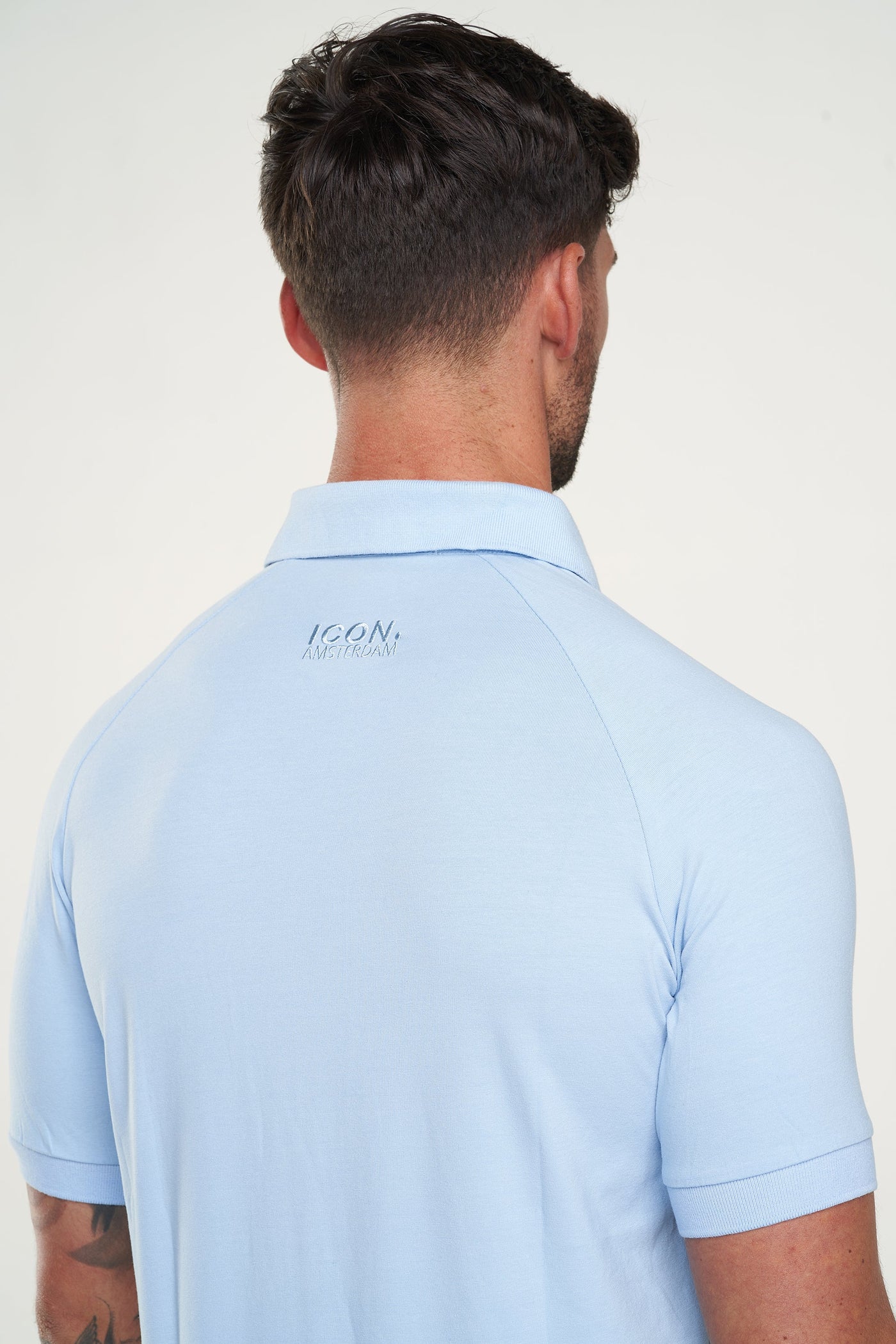 LE POLO MUSCLE BUTTON NOIR